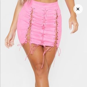Pretty Little Thing pink lace up skirt